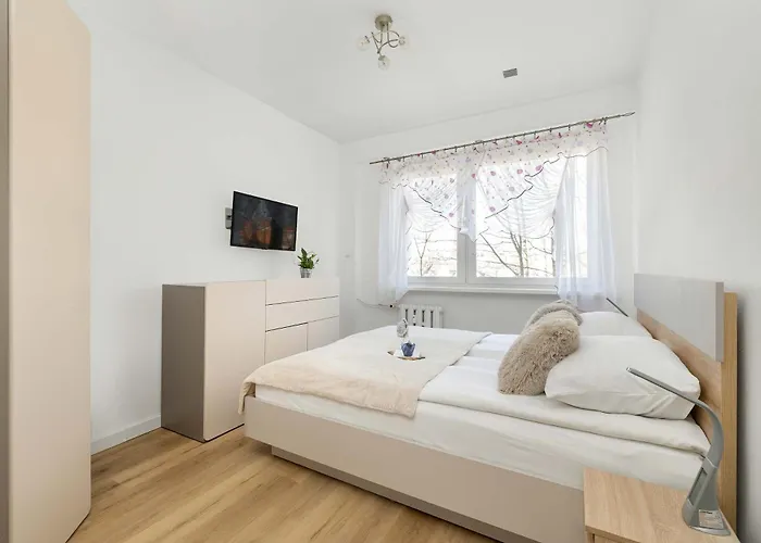 Jasny Apartament z Balkonem by Noclegi Renters * Kołobrzeg