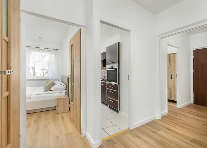 Jasny Apartament z Balkonem by Noclegi Renters Apartament Kołobrzeg